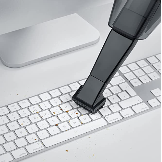 mini brosse aspirateur à main